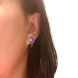 Pickleball stud earrings in use
