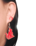 Cat earrings worn