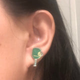 Pickleball stud earring in use - Green